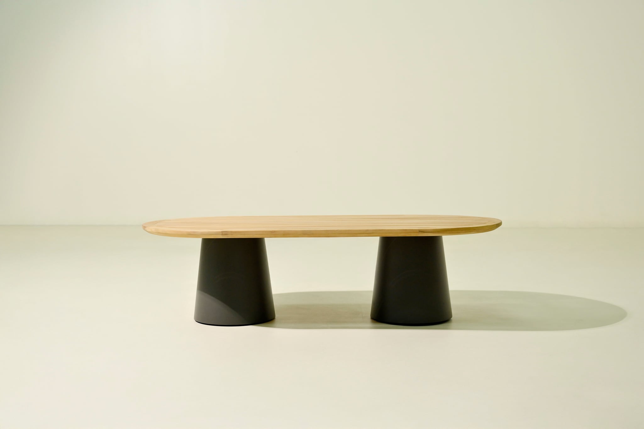 Conning oval coffee table