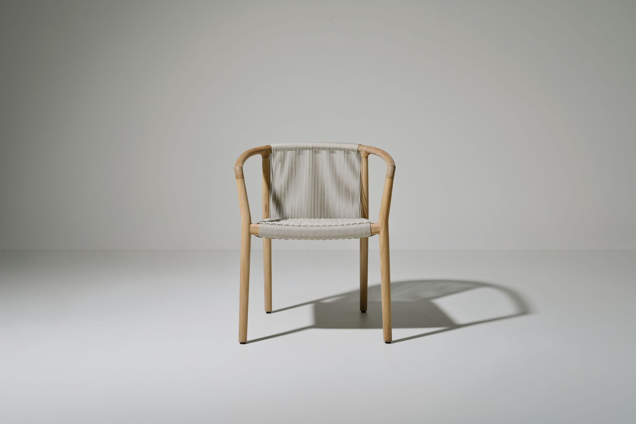 Royce teak dining armchair