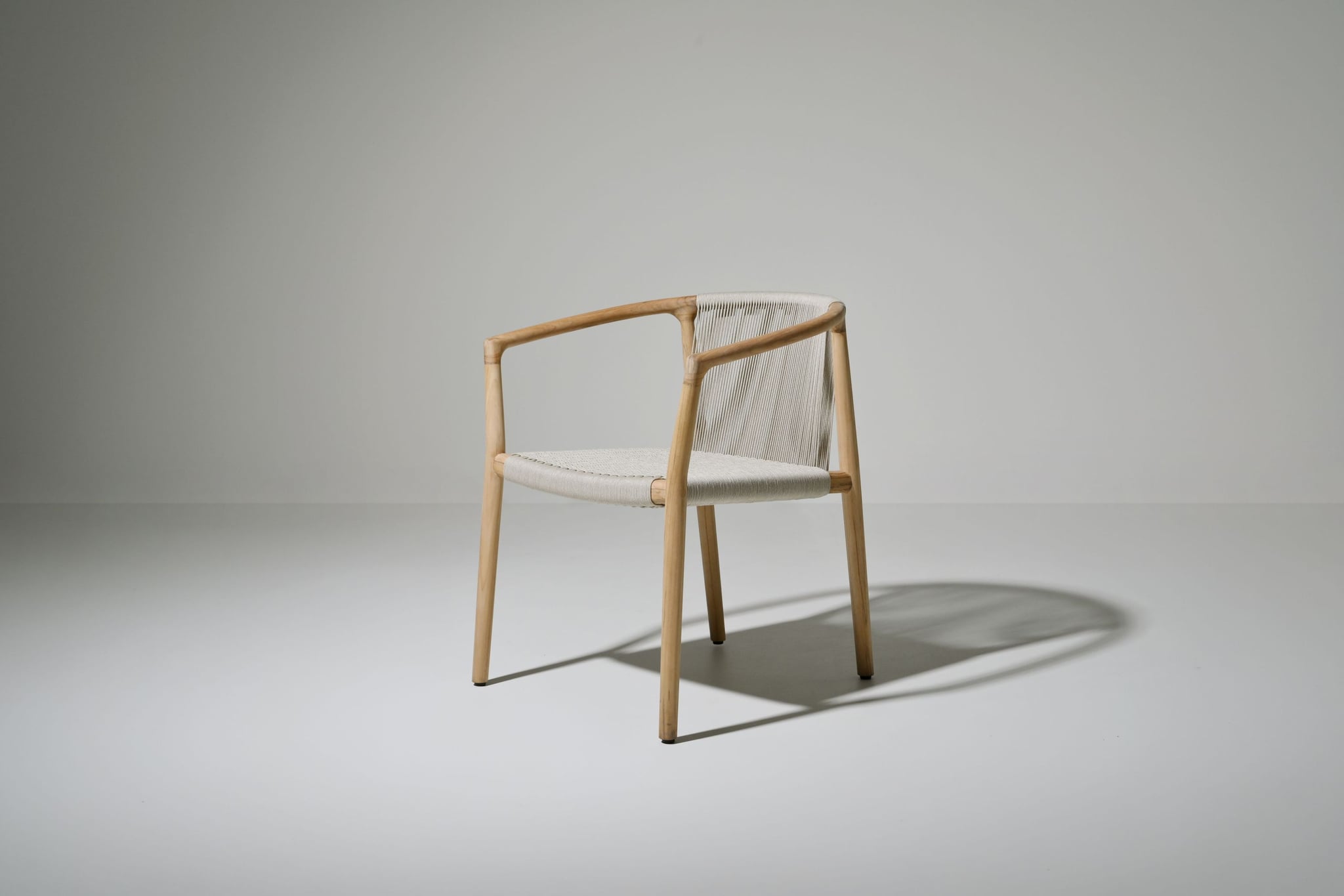 Royce teak dining armchair