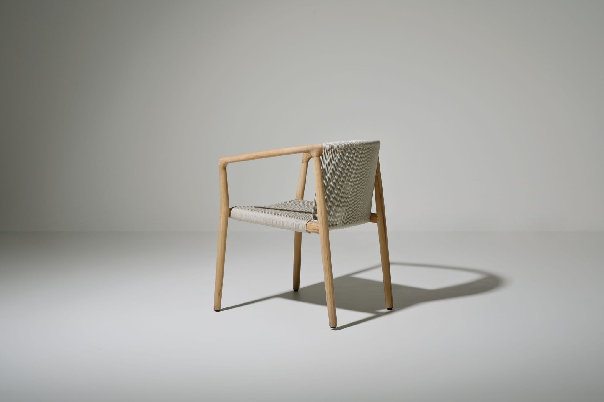 Royce teak dining armchair