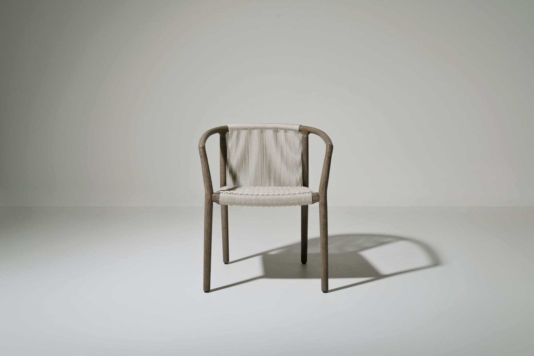 Royce teak dining armchair