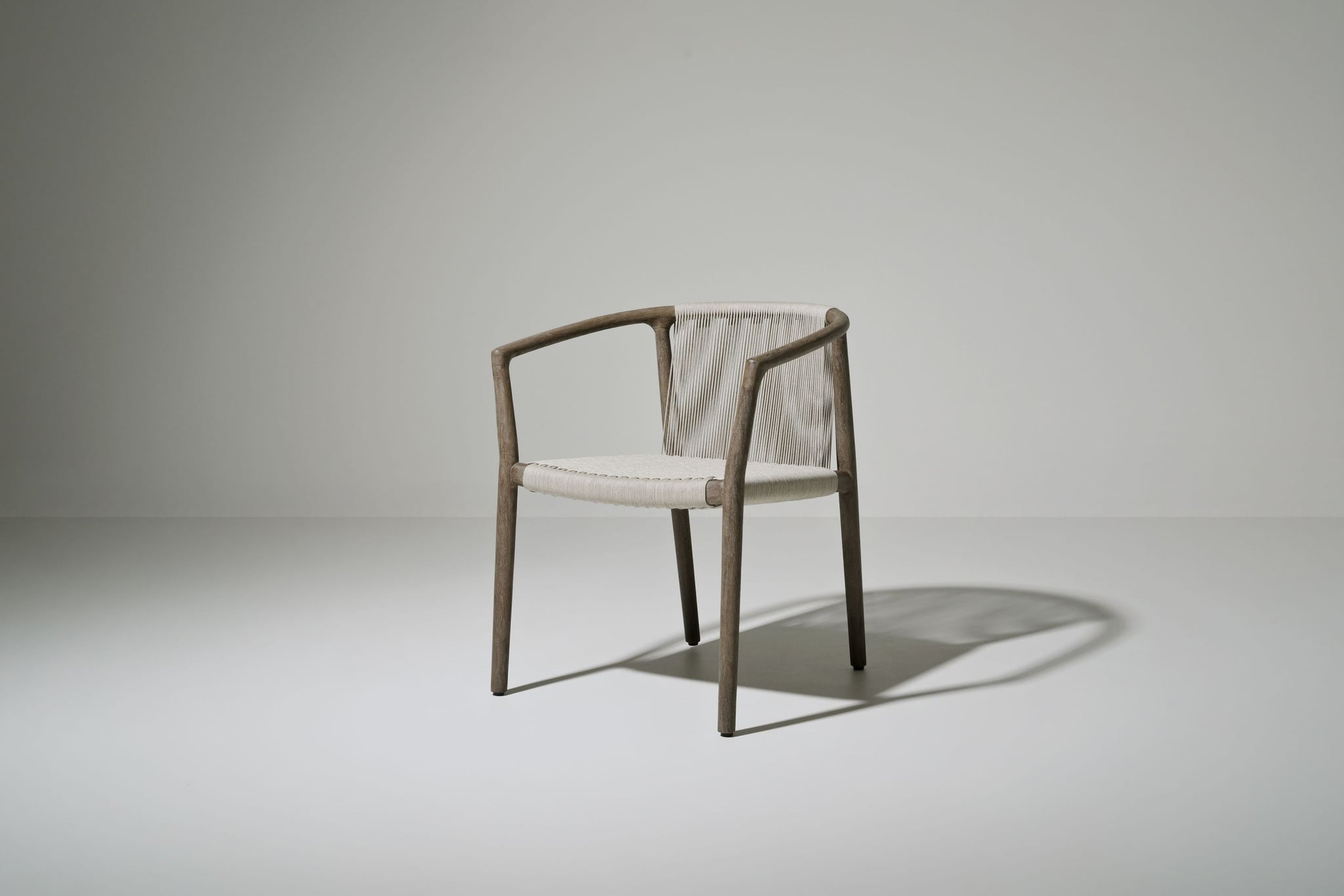 Royce teak dining armchair