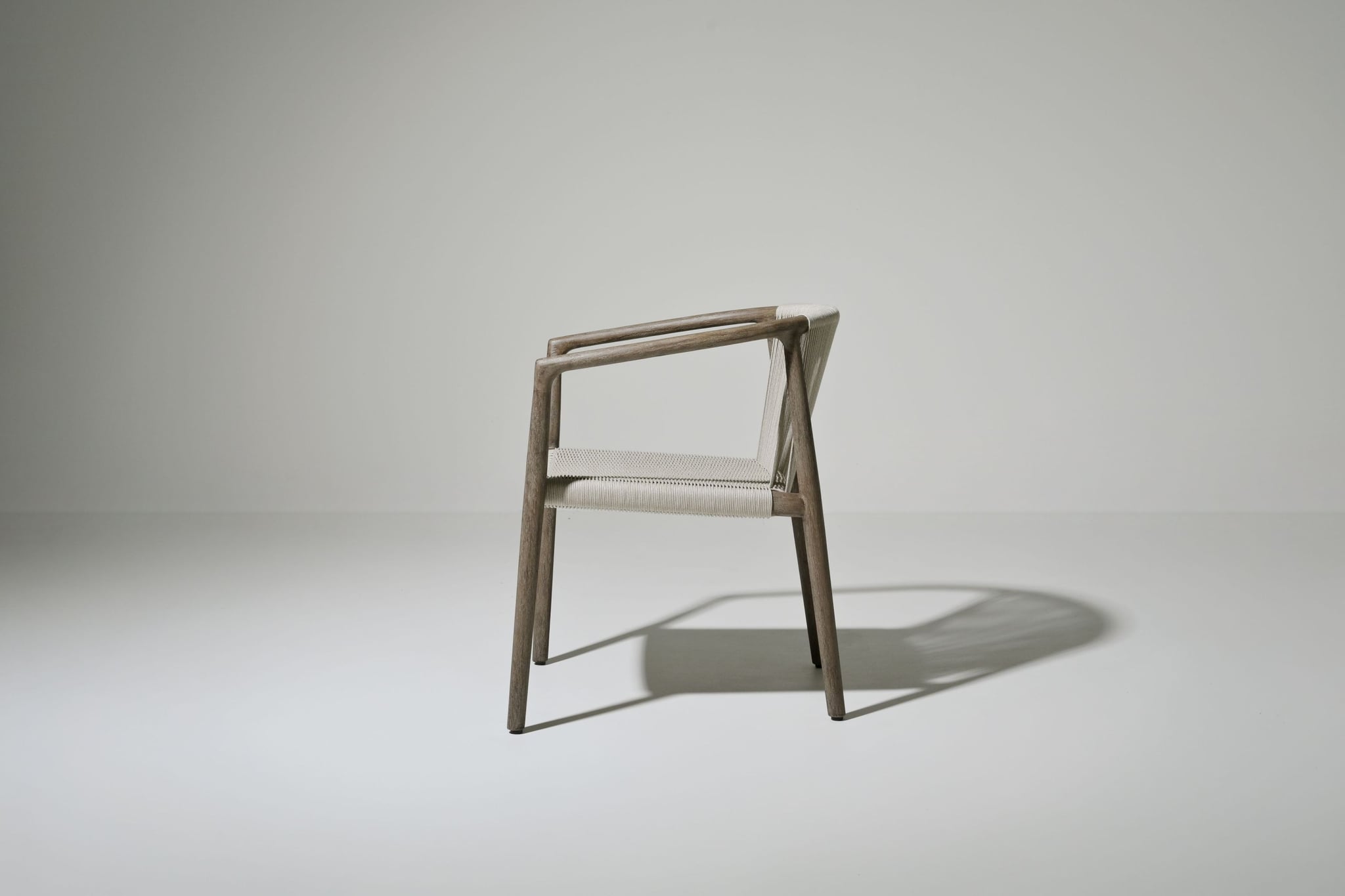 Royce teak dining armchair