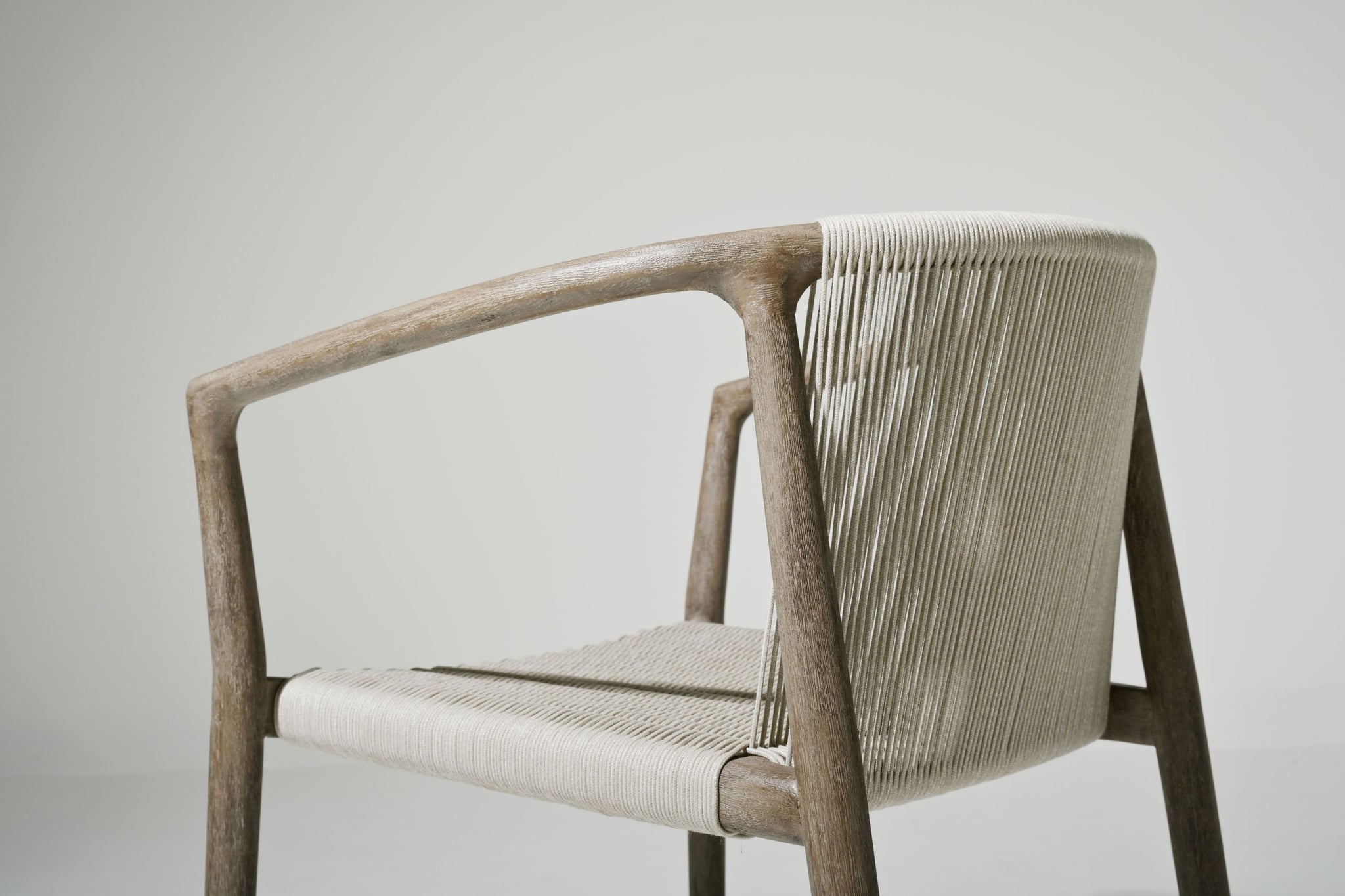 Royce teak dining armchair