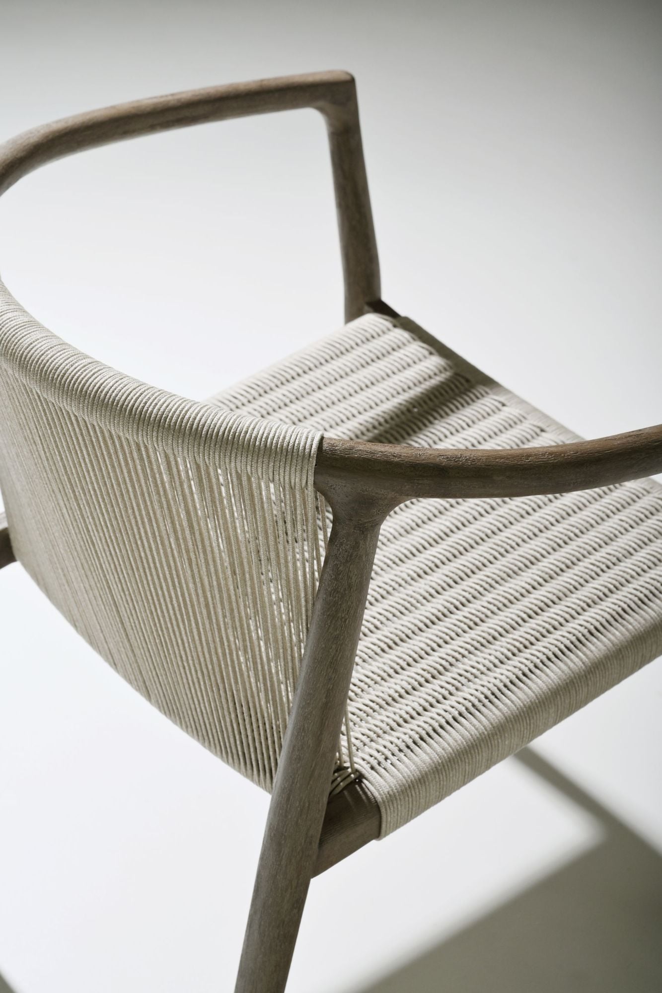 Royce teak dining armchair