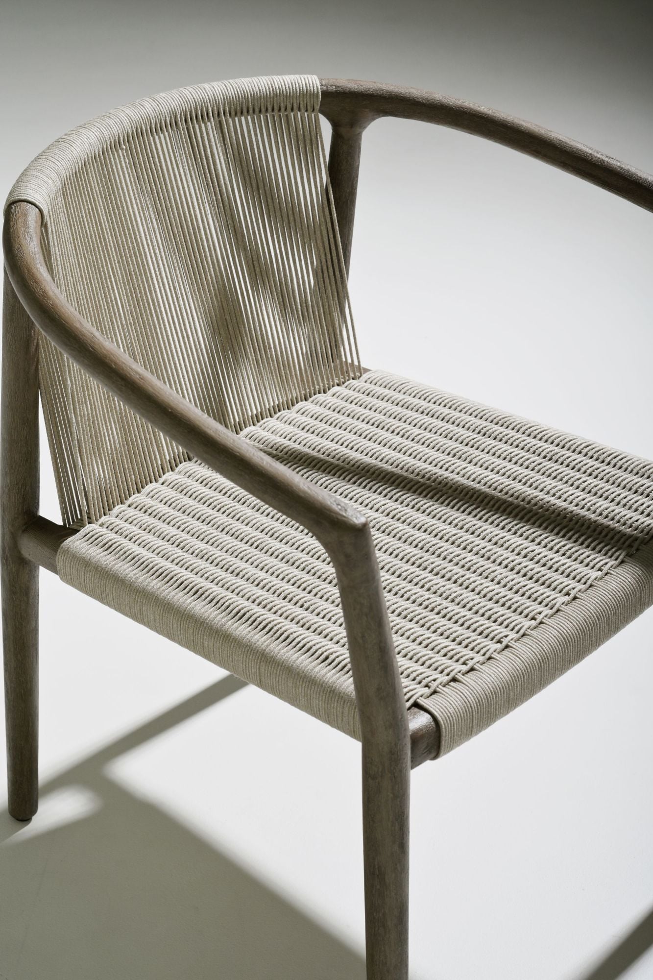 Royce teak dining armchair